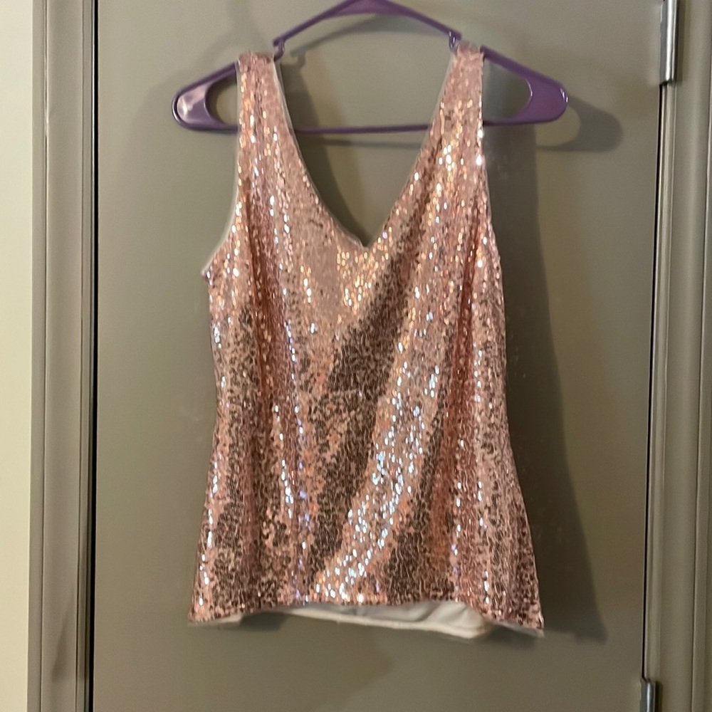 Five dollar sale. Pink rose gold top with zipper detail.